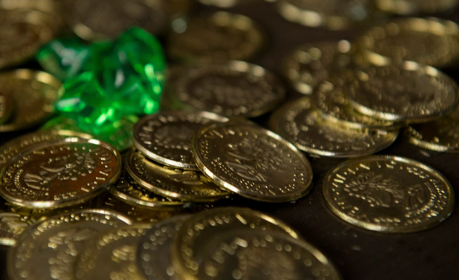 Fake doubloons and jewels are laid on a table as props during the 86th Force Support Squadron Vogelweh Community Center’s Port Royal Mystery Escape Room on June 21, 2016, at Vogelweh Military Complex, Germany. The escape room is a pirate-themed event where participants have one hour to solve riddles. An escape room quote that wins work: template and worked prices