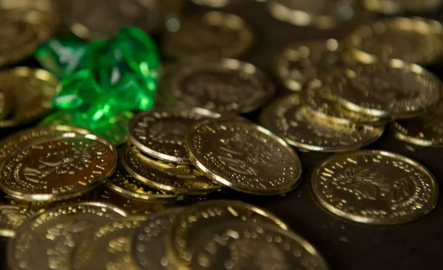 Fake doubloons and jewels are laid on a table as props during the 86th Force Support Squadron Vogelweh Community Center’s Port Royal Mystery Escape Room on June 21, 2016, at Vogelweh Military Complex, Germany. The escape room is a pirate-themed event where participants have one hour to solve riddles. An escape room quote that wins work: template and worked prices