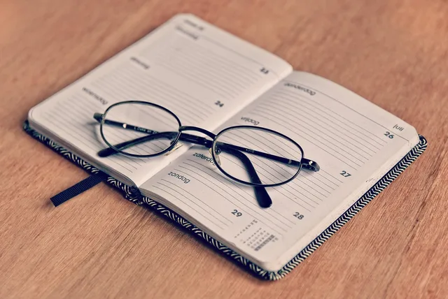 agenda, note book, schedule, planner, organizer, memo, appointment, deadline, day, glasses, spectacles, vision, eye, see, brown book, brown books, brown eye, brown glass, brown glasses, brown schedule, brown note, brown vision, agenda, agenda, agenda, schedule, schedule, schedule, planner, planner, planner, planner, planner, appointment. Scheduling escape room work so nothing slips